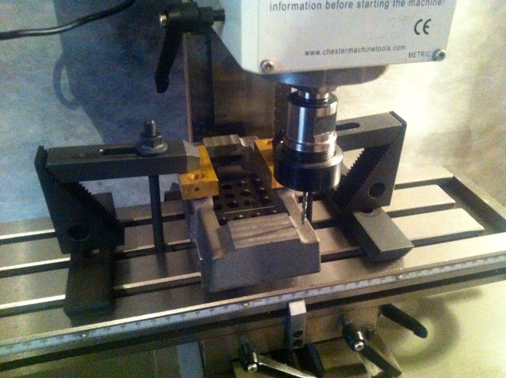 27. using the mill to drill the sole plate fixing holes.jpg