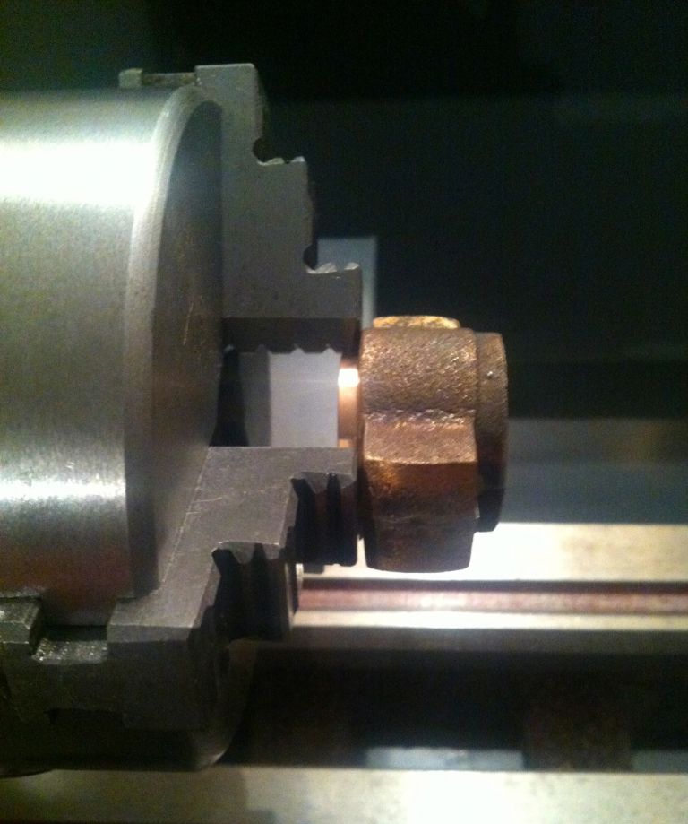 75. holding the top bearing halfs in the 3 jaw.jpg