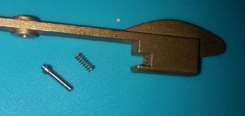 Friction pin and spring