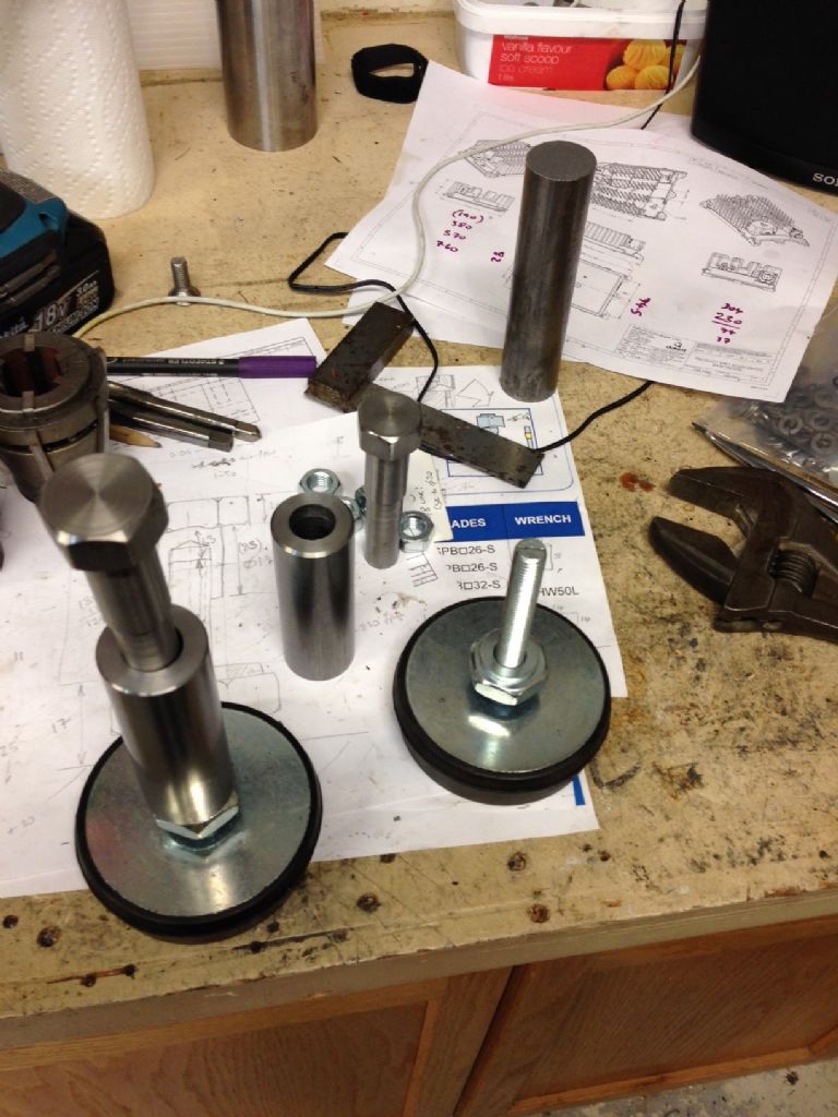 Machine mounts with spacers and female bolts